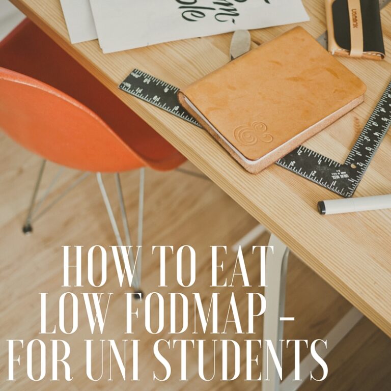 A desk with a notebook, rulers, a pen, and an orange chair. White text on the image reads, How to eat low FODMAP – for uni students.