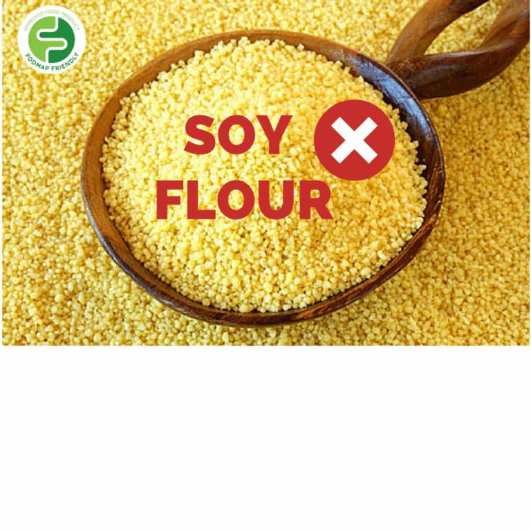 A wooden spoon filled with yellow soya flour granules, surrounded by more soya flour. The words SOYA FLOUR and a red X are overlaid on the image. A green FODMAP Friendly logo appears in the top left corner.