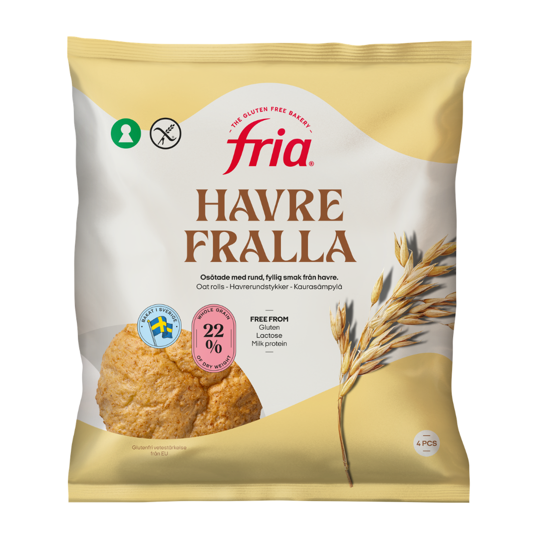 A beige bag of Fria Oat Roll oat rolls. The packaging features an image of a roll and oat stalks, highlighting that it’s gluten-free and lactose-free, and contains 22% oats.