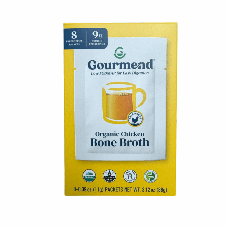 A yellow box of Gourmend organic chicken bone broth featuring a mug of broth on the front. The box highlights 8 freeze-dried sachets, 9g protein per serving, and certifications like Soil Association Organic.