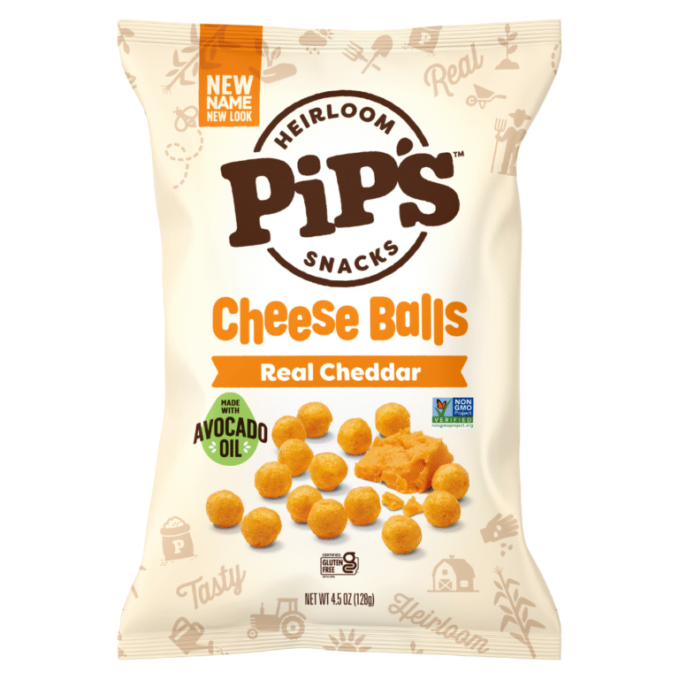 A bag of Pips Heirloom Snacks Cheese Balls, Real Cheddar flavour. The packaging features cheese balls, a cheddar wedge, and labels for avocado oil and non-GM ingredients—perfect for fans of mini popcorn and other Heirloom Snacks. Net weight: 4.5 oz (128g).