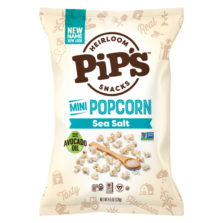 A bag of Pip’s Heirloom Snacks Mini Popcorn, Sea Salt Popcorn flavour, made with avocado oil. The beige packaging features popcorn imagery and a wooden spoon, highlighting non-GMO and gluten-free labels. Net weight: 128g.