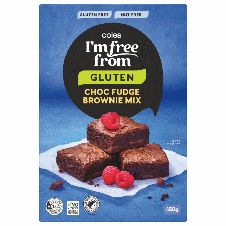 Box of Coles I’m Free From Gluten Choc Fudge Brownie Mix with three brownies and raspberries on white paper, blue background, and product labels for gluten free, nut free, 450g net weight—perfect alongside Crinkle Cut Salt & Vinegar Crisps.